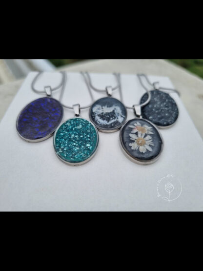 Silver metallic pendants with chains